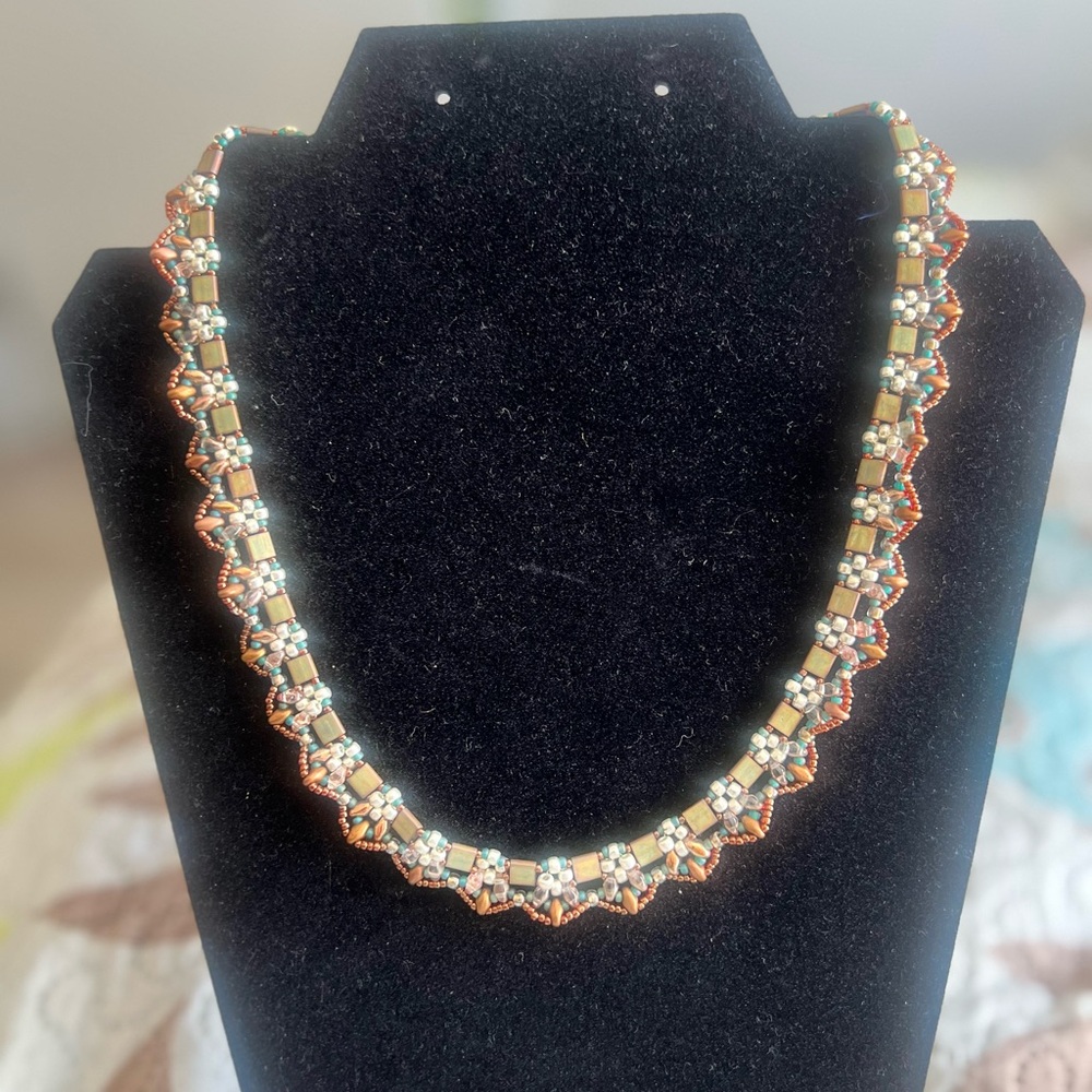 Chic Handmade Beaded Necklace measures 17.5 inches long..